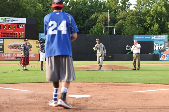 Air Force Vice Chief of Staff Gen. Larry O. Spencer throws the first pitch of the 3rd annual Amputee Warrior Softball Classic June 6, 2015, at Prince George's Stadium in Bowie, Md. (U.S. Air Force photos/Staff Sgt. Carlin Leslie)