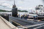 YOKOSUKA, Japan (June 8, 2015) - Sailors assigned to the Los Angeles-class attack submarine USS Hampton (SSN 767) secure mooring lines while pulling into Fleet Activities Yokosuka for a scheduled port visit. 