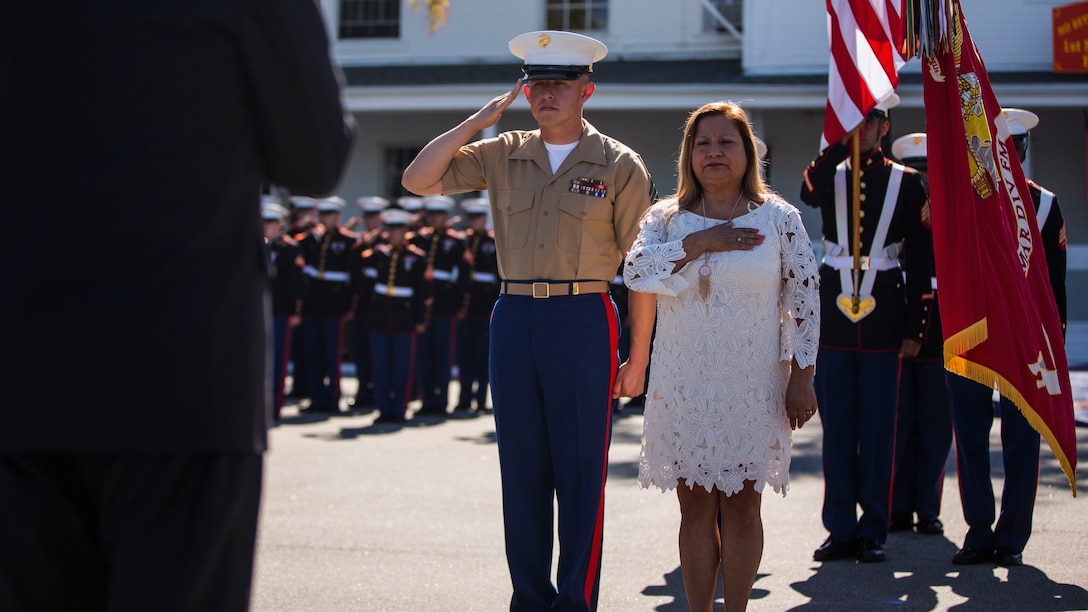 U.S. Marine Sgt. Jamie Andrade, a motor transport operatorwith Headquarters Battalion, 1st Marine Division, stands with Rosa Peralta, the mother of the late Sgt. Rafael Peralta, during a Navy Cross Presentation Ceremony held in his honor aboard Camp Pendleton, Calif., June 8, 2015. Peralta was awarded the Navy Cross for his actions in support of Operation Al Fajr in Fallujah, Al Anbar province, Iraq, on Nov. 15, 2004, where he covered an enemy grenade with his body protect his fellow Marines.