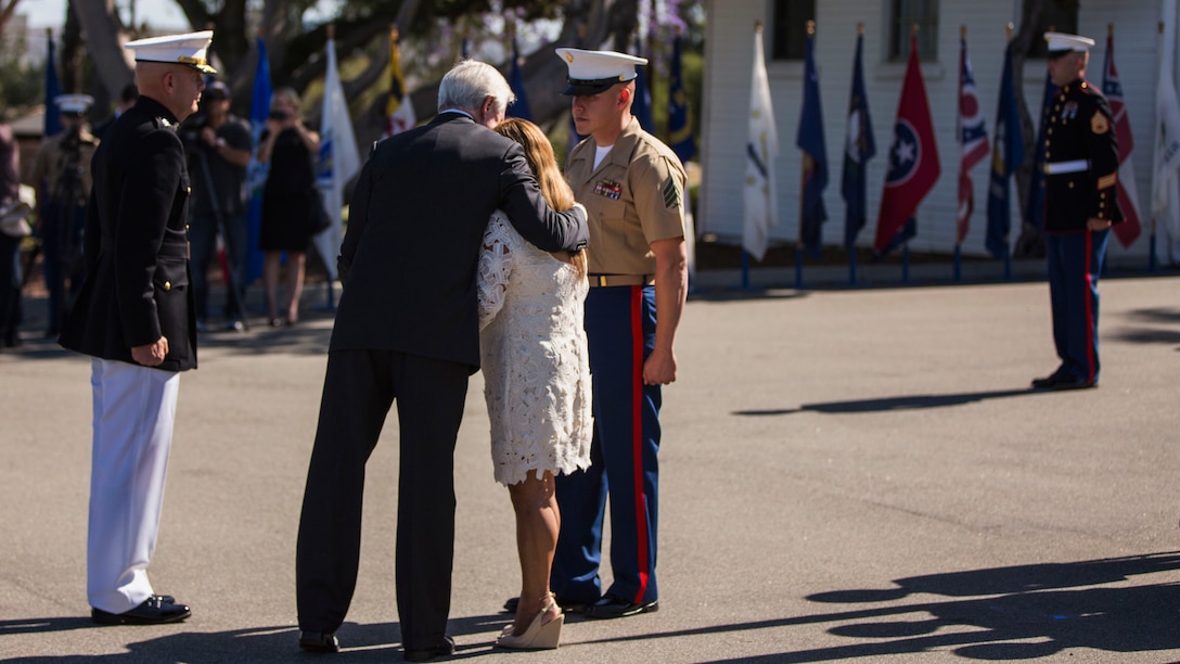 Secretary of the Navy Ray Mabus hugs Rosa Peralta, the mother of the late Sgt. Rafael Peralta, during a ceremony held in his honor at Marine Corps Base Camp Pendleton, California, June 8, 2015. Peralta was awarded the Navy Cross for his actions in support of Operation Al Fajr in Fallujah, Al Anbar province, Iraq, on Nov. 15, 2004, where he covered an enemy grenade with his body protect his fellow Marines.