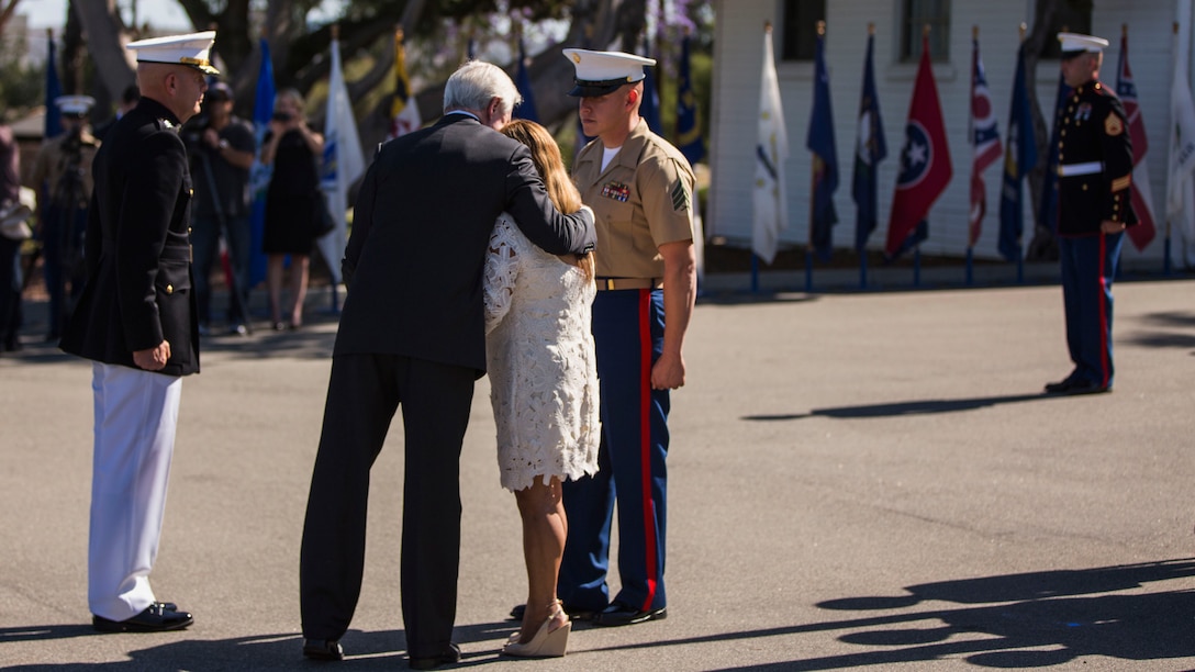 Secretary of the Navy Ray Mabus hugs Rosa Peralta, the mother of the late Sgt. Rafael Peralta, during a ceremony held in his honor at Marine Corps Base Camp Pendleton, California, June 8, 2015. Peralta was awarded the Navy Cross for his actions in support of Operation Al Fajr in Fallujah, Al Anbar province, Iraq, on Nov. 15, 2004, where he covered an enemy grenade with his body protect his fellow Marines.