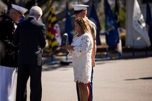 Secretary of the Navy Ray Mabus presents the Navy Cross to Rosa Peralta, the mother of the late Sgt. Rafael Peralta, during a ceremony held in his honor aboard Camp Pendleton, Calif., June 8, 2015. Peralta was awarded the Navy Cross for his actions in support of Operation Al Fajr in Fallujah, Al Anbar province, Iraq on Nov. 15, 2004, where he covered an enemy grenade with his body protect his fellow Marines. (U.S. Marine Corps photo by Lance Cpl. Clarence A. Leake/Released)