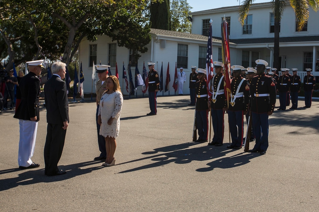 U.S. Marines with 1st Marine Division and family members of the late Sgt. Rafael Peralta attend a Navy Cross Ceremony in his honor on Camp Pendleton, Calif., June 08, 2015. Peralta was awarded the Navy Cross for his actions in support of Operation Al Fajr, in Fallujah, Iraq on November 15, 2004 where he reached out and covered an enemy grenade with his body to shield the blast from his fellow Marines. (U.S. Marine Corps photo by Lance Cpl. Clarence A. Leake/Released)