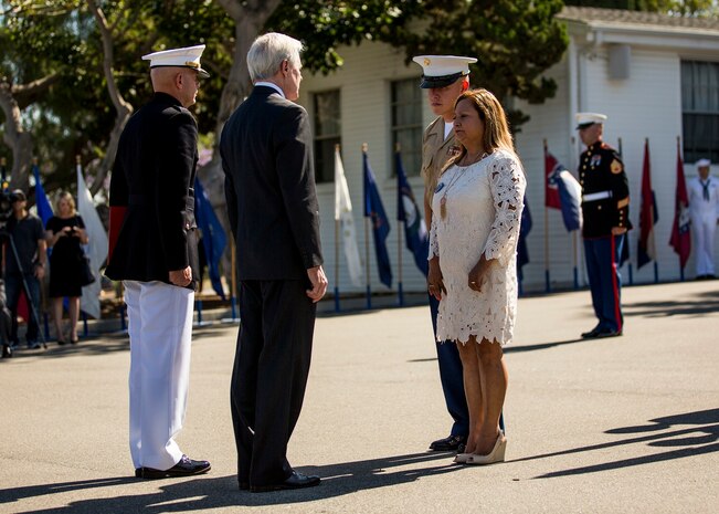 Secretary of the Navy Ray Mabus presents the Navy Cross to Rosa Peralta, the mother of the late Sgt. Rafael Peralta, aboard Camp Pendleton, Calif., June 8, 2015. Sgt. Rafael Peralta was awarded the Navy Cross posthumously after sacrificing his life by absorbing the blast of an enemy grenade and shielding fellow Marines only feet away while serving with Regimental Combat Team 7, 1st Marine Division in Fallujah, Al Anbar province, Iraq, on Nov. 15, 2004. (U.S. Marine Corps photo by Sgt. Luis Vega/Released)