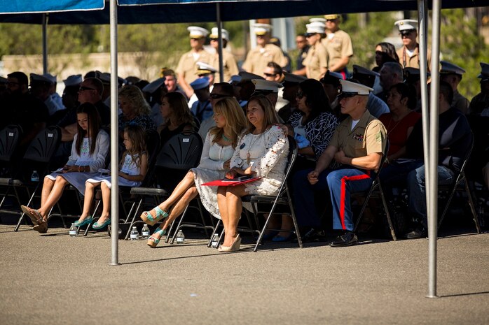 U.S. Marines and Sailors watch as Secretary of the Navy Ray Mabus presents the Navy Cross to the family members of the late Sgt. Rafael Peralta aboard Camp Pendleton, Calif., June 8, 2015. Sgt. Rafael Peralta was awarded the Navy Cross posthumously after sacrificing his life by absorbing the blast of an enemy grenade and shielding fellow Marines only feet away while serving with Regimental Combat Team 7, 1st Marine Division in Fallujah, Al Anbar province, Iraq, on Nov. 15, 2004. (U.S. Marine Corps photo by Sgt. Luis Vega/Released)