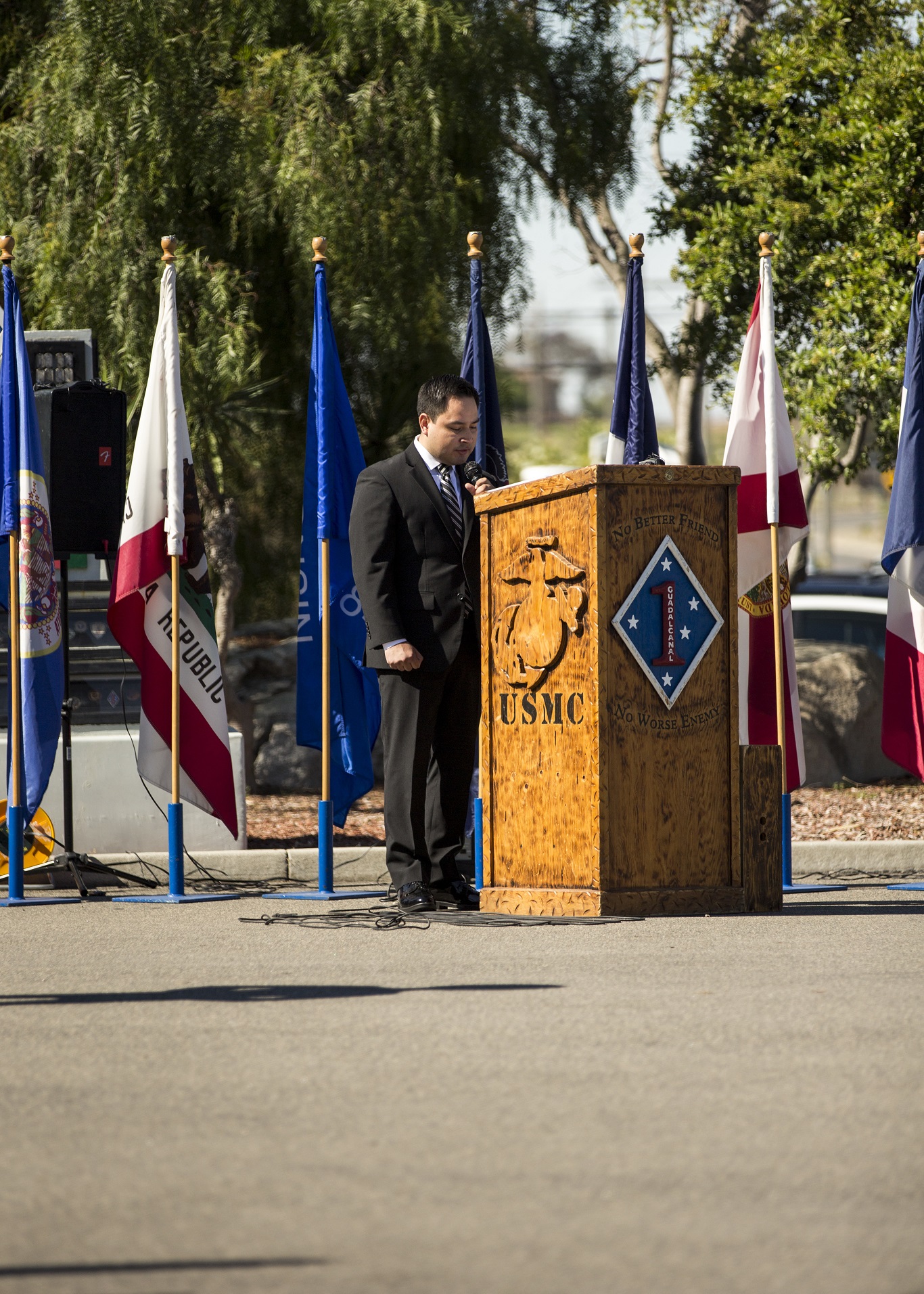 Ricardo Peralta, the brother of the late Sgt. Rafael Peralta, speaks on behalf of his family during a Navy Cross Presentation Ceremony held in honor of his brother aboard Camp Pendleton, Calif., June 8, 2015. Sgt. Rafael Peralta was awarded the Navy Cross posthumously after sacrificing his life by absorbing the blast of an enemy grenade and shielding fellow Marines only feet away while serving with Regimental Combat Team 7, 1st Marine Division in Fallujah, Al Anbar province, Iraq, on Nov. 15, 2004. (U.S. Marine Corps photo by Sgt. Luis Vega/Released)
