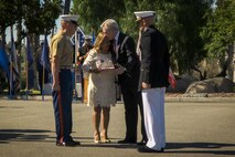 Secretary of the Navy Ray Mabus presents the Navy Cross to Rosa Peralta, the mother of the late Sgt. Rafael Peralta, aboard Camp Pendleton, Calif., June 8, 2015. Sgt. Rafael Peralta was awarded the Navy Cross posthumously after sacrificing his life by absorbing the blast of an enemy grenade and shielding fellow Marines only feet away while serving with Regimental Combat Team 7, 1st Marine Division in Fallujah, Al Anbar province, Iraq, on Nov. 15, 2004. (U.S. Marine Corps photo by Sgt. Donald Holbert/Released)