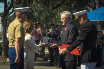 Secretary of the Navy Ray Mabus presents the Navy Cross to Rosa Peralta, the mother of the late Sgt. Rafael Peralta, aboard Camp Pendleton, Calif., June 8, 2015. Sgt. Rafael Peralta was awarded the Navy Cross posthumously after sacrificing his life by absorbing the blast of an enemy grenade and shielding fellow Marines only feet away while serving with Regimental Combat Team 7, 1st Marine Division, in Fallujah, Al Anbar province, Iraq, on Nov. 15, 2004. (U.S. Marine Corps photo by Lance Cpl. James Trevino/Released)
