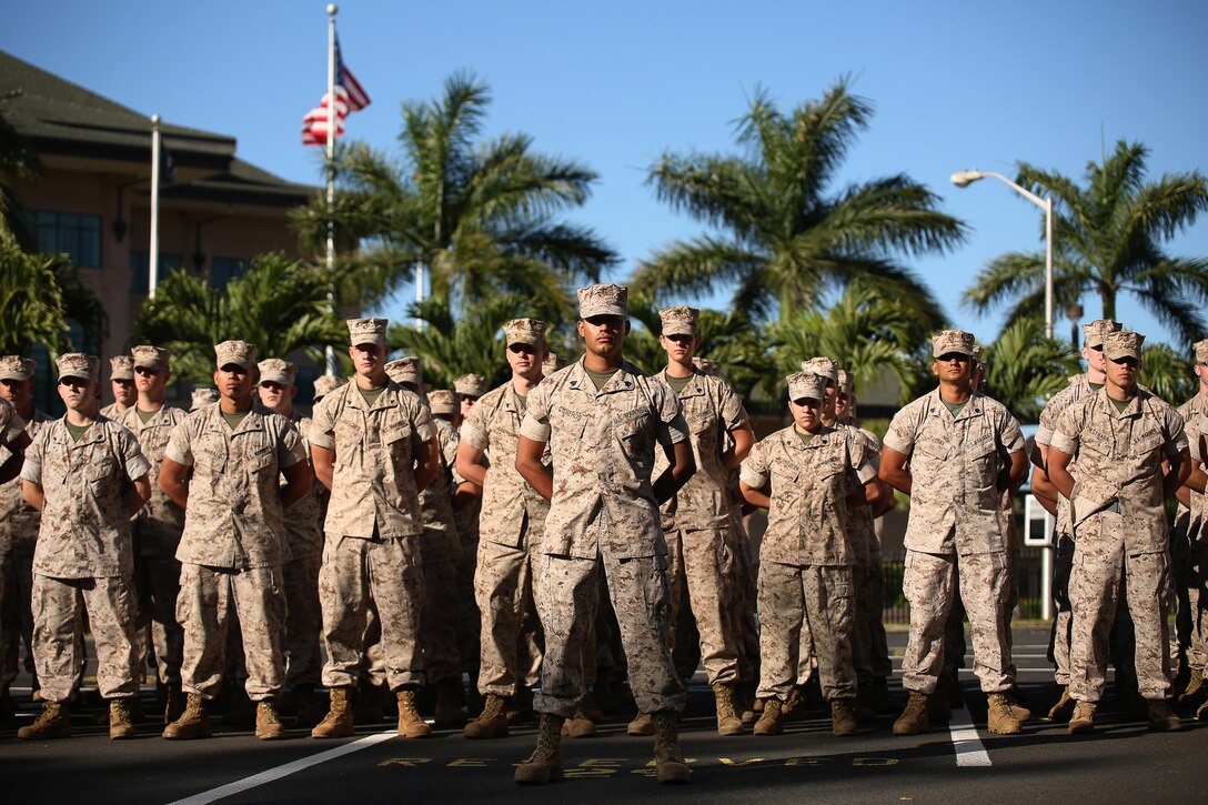 Marines with U. S. Marine Corps Forces, Pacific stand in formation during a conference room dedication ceremony at Camp H. M. Smith, Hawaii, June 9, 2015. The ceremony was held to dedicate three conference rooms to be named after Retired Sgt. Maj. Mike D. Mervosh, former Fleet Marine Forces Pacific sergeant major and veteran of World War II, Korea and Vietnam; Retired Lt. Gen. Henry Stackpole III, former MARFORPAC commander; and Jim Nabors, honorary Marine sergeant who played Gomer Pyle in a television show. (U.S. Marine Corps photo by Sgt. Sarah Anderson)