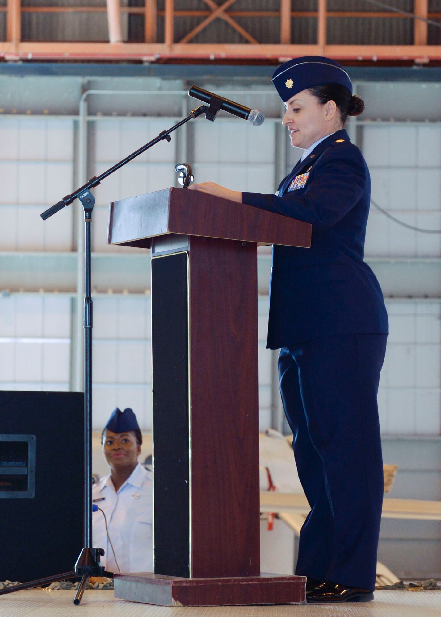Maj. Rebecca A. Hart, the 49th Aircraft Maintenance Squadron incoming commander, gives her closing remarks for the 49th AMXS Change of Command at Holloman Air Force Base, N.M. June 9, 2015. During the Change of Command, Col. Michael Shea, the 49th Maintenance Group commander was the presiding officer and Hart assumed command. The 49 AMXS generates over 73 thousand flight hours annually in support of the Air Force's largest and fastest growing Formal Training Unit and combat operations around the world.  Additionally, the 49 AMXS maintains a continuous forward presence with nearly 15 percent of assigned Airmen deployed in support of combat and humanitarian operations for multiple Combatant Commanders.  Finally, the squadron manages aircraft and resources valued at over $402 million and execute a $2.4 million budget. (U.S. Air Force photo by Staff Sgt. E’Lysia A. Wray/Released)