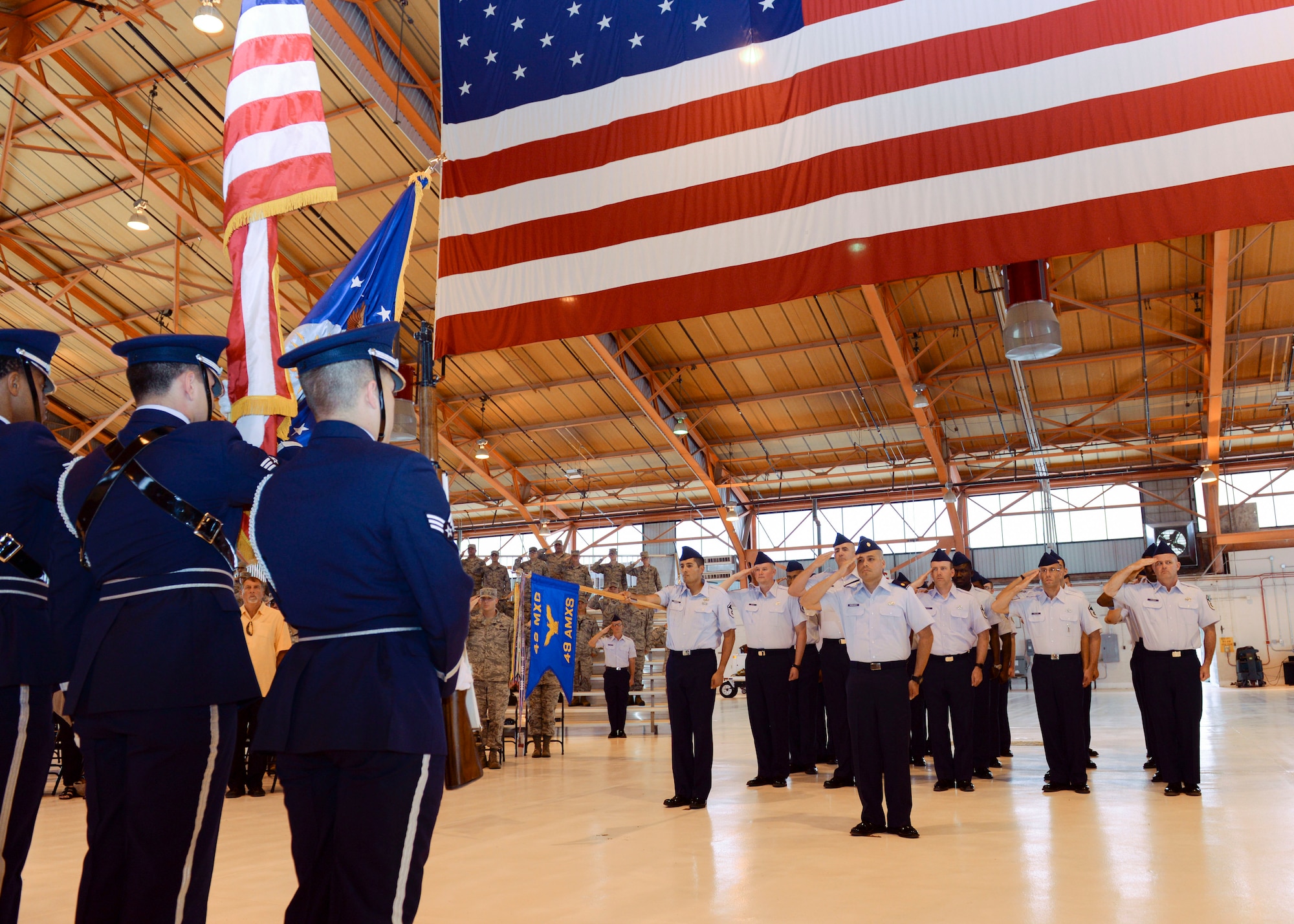 The Holloman Air Force Base Steel Talons Honor Guard presents the colors at the 49th Aircraft Maintenance Squadron Change of Command at Holloman Air Force Base, N.M. June 9, 2015. During the Change of Command, Col. Michael Shea, the 49th Maintenance Group commander was the presiding officer and Maj. Rebecca A. Hart, the 49th AMXS incoming commander, assumed command. The 49 AMXS generates more than 73,000 flight hours annually in support of the Air Force's largest and fastest growing Formal Training Unit and combat operations around the world.  Additionally, the 49 AMXS maintains a continuous forward presence with nearly 15 percent of assigned Airmen deployed in support of combat and humanitarian operations for multiple combatant commanders. Finally, the squadron manages aircraft and resources valued at more than $402 million and execute a $2.4 million budget. (U.S. Air Force photo by Staff Sgt. E’Lysia A. Wray/Released)