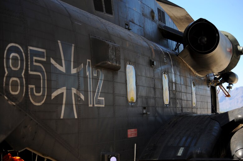 A German Air Force CH-53GS helicopter sits on the flightline during Angel Thunder 2015 at Davis-Monthan Air Force Base, Ariz., June 7, 2015.  Angel Thunder is the largest personnel recovery exercise in the world combining joint, coalition and interagency personnel. Participants will train through the full spectrum of personnel recovery capabilities with numerous types of aircraft.  (U.S. Air Force photo by Airman 1st Class Chris Massey/Released)