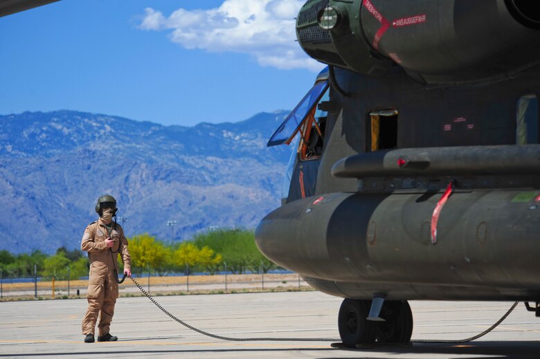 A German Air Force maintainer performs pre-flight checks on a German Air Force CH-53GS during Angel Thunder 2015 at Davis-Monthan Air Force Base, Ariz., June 7, 2015.  Angel Thunder is the world's largest personnel recovery exercise.  D-M hosted 11 partner nations and nine interagencies with a common goal to train personnel recovery forces to prepare, plan, execute and adapt for rescue missions.   (U.S. Air Force photo by Airman 1st Class Chris Massey/Released)