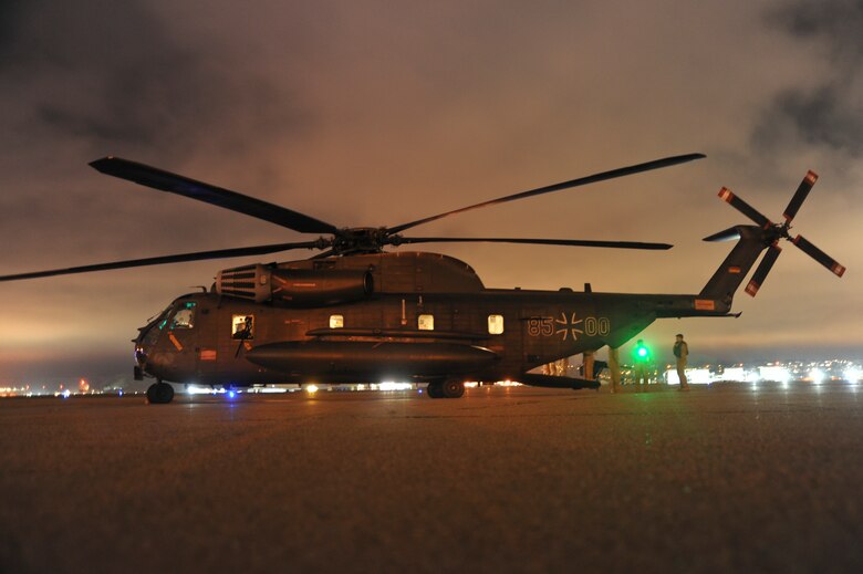 A German Air Force CH-53GS waits to be refueled at Naval Air Station North Island, Calif., during Angel Thunder 2015, June 7, 2015.   Angel Thunder is the world's largest personnel recovery exercise.  D-M hosted 11 partner nations and nine interagencies with a common goal to train personnel recovery forces to prepare, plan, execute and adapt for rescue missions.  (U.S. Air Force photo by Airman 1st Class Chris Massey/Released)