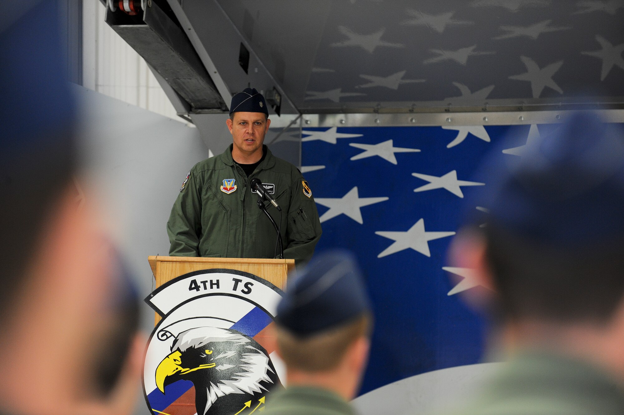 Lt. Col. Trent Tripple, incoming 4th Training Squadron commander, speaks to members of the 4th TS during the unit’s change of command ceremony, June 5, 2015, at Seymour Johnson Air Force Base, North Carolina. Prior to assuming command of the training squadron, Tripple was the 4th Fighter Wing chief of safety. (U.S. Air Force photo/Airman 1st Class Aaron J. Jenne) 