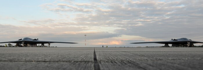 Two B-2 Spirits sit on the flightline at Royal Air Force Fairford, England, June 8, 2015 after a hot-pit refueling. The hot-pit refueling also showcased the partnership between active duty and Air National Guard Airmen from the 131st Bomb Wing from Whiteman Air Force Base, MO, who coordinated the B-2’s presence in the European area of responsibility. (U.S. Air Force photo/Capt. Christopher Mesnard)