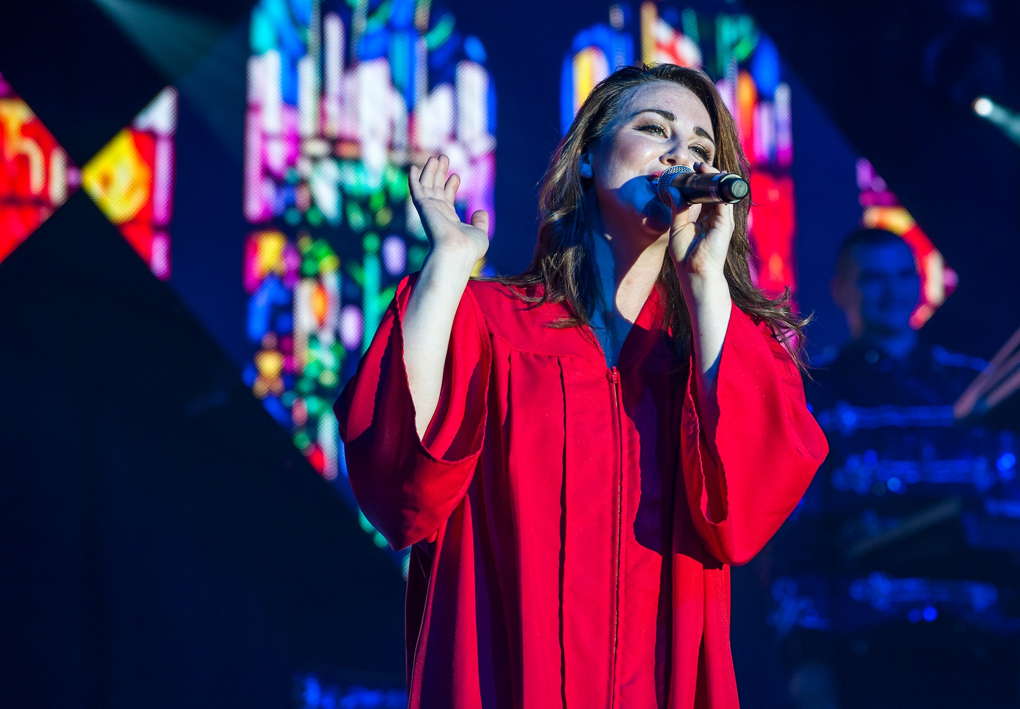 2nd Lt. Lauren Rogers sings during Tops in Blue’s Freedom’s Song World Tour at the Emerald Coast Convention Center, June 6 in Fort Walton Beach, Fla. The Meridian, Miss., native was one of 37 Airmen selected for the special unit based on her ability to entertain.  The TIB team is also the “road crew” for each show. Managed by seven technical personnel, they are responsible for the transporting and setting up more than 65,000 pounds of stage equipment.  TIB’s mission is to provide entertainment to military personnel and their families at home and abroad.  (U.S. Air Force photo/Ilka Cole)