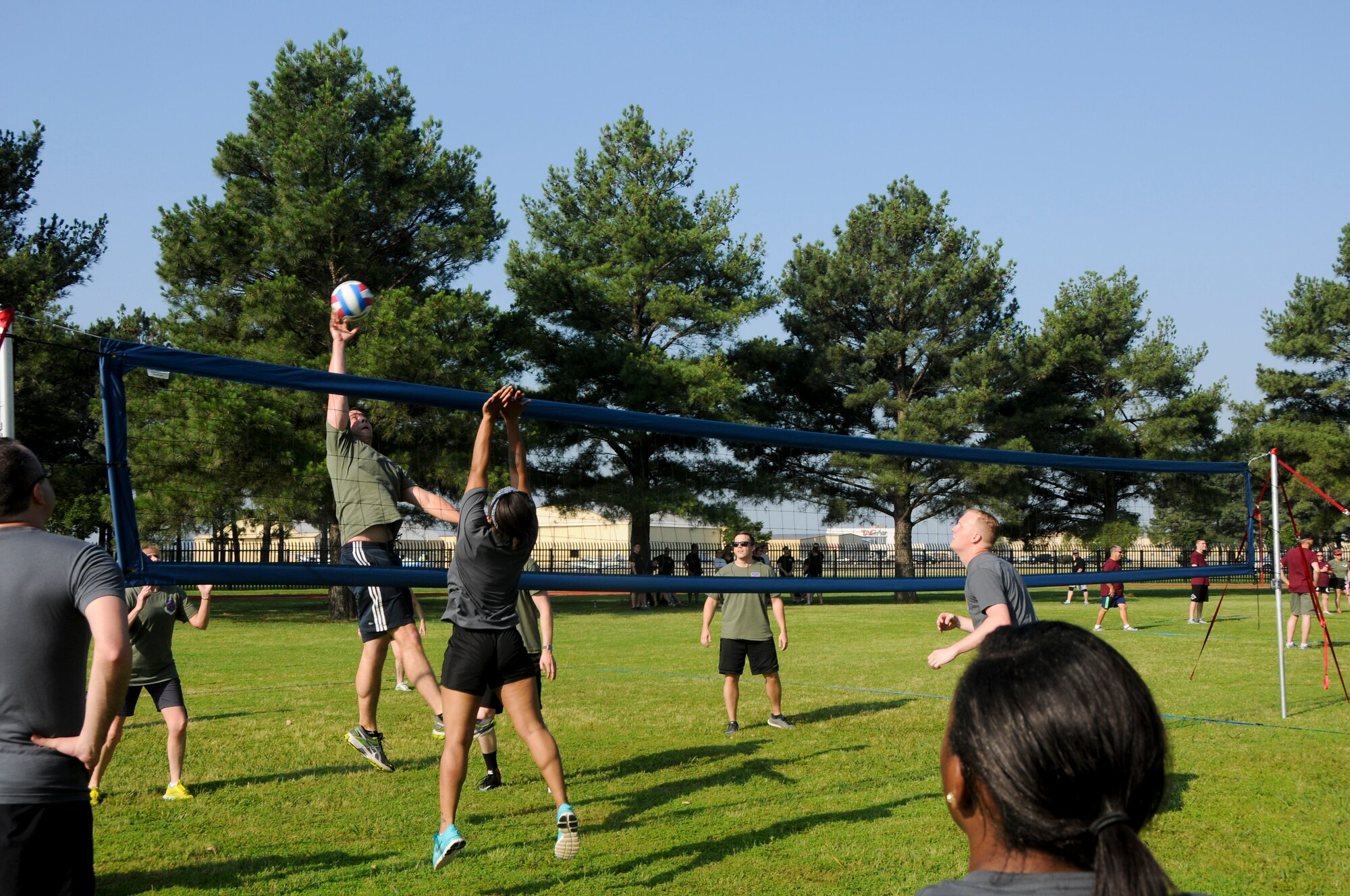 Members of the 188th Wing gathered together to compete in multiple physical challenges for Wingman day 2015 held June 7, at Ebbing Air National Guard Base, Fort Smith, Ark. Wingman Day is designed to encourage Airmen to build and foster positive relationships in their work areas and throughout the wing. The day’s events consisted of a 1.5 mile run, volleyball, horseshoes, a mile relay, free-throw competition, golf pitching and a casting contest. Brig. Gen. James Vogel, Arkansas Air National Guard commander, and Col. Bobbi Doorenbos, 188th Wing commander, presented awards to team winners at the conclusion of the day’s events. (U.S. Air National Guard photo by Senior Airman Cody Martin/Released)
