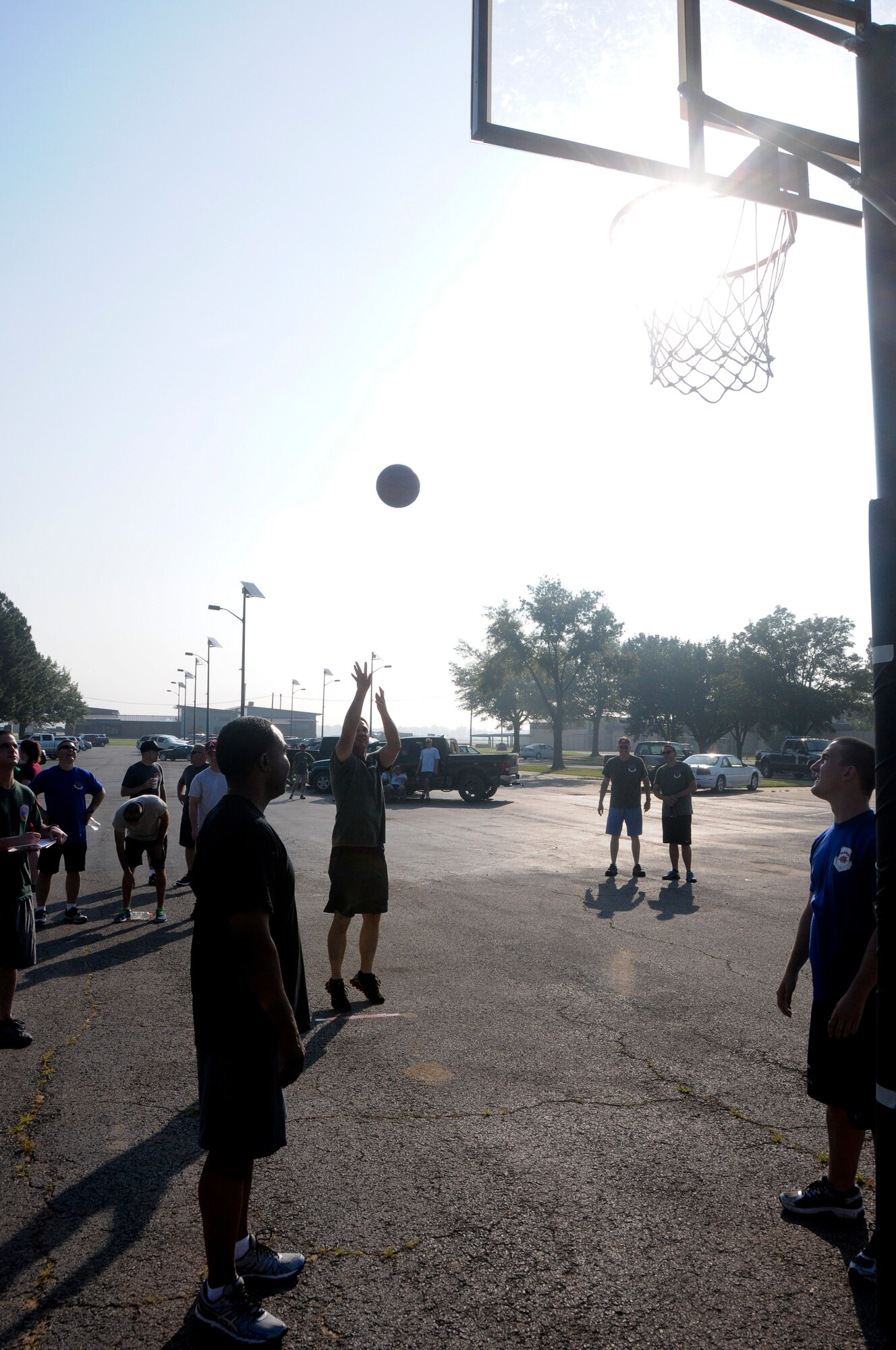 Members of the 188th Wing gathered together to compete in multiple physical challenges for Wingman day 2015 held June 7, at Ebbing Air National Guard Base, Fort Smith, Ark. Wingman Day is designed to encourage Airmen to build and foster positive relationships in their work areas and throughout the wing. The day’s events consisted of a 1.5 mile run, volleyball, horseshoes, a mile relay, free-throw competition, golf pitching and a casting contest. Brig. Gen. James Vogel, Arkansas Air National Guard commander, and Col. Bobbi Doorenbos, 188th Wing commander, presented awards to team winners at the conclusion of the day’s events. (U.S. Air National Guard photo by Senior Airman Cody Martin/Released)