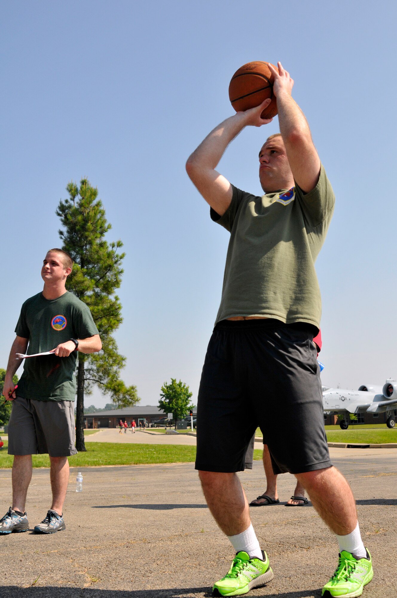 Members of the 188th Wing gathered together to compete in multiple physical challenges for Wingman day 2015 held June 7, at Ebbing Air National Guard Base, Fort Smith, Ark. Wingman Day is designed to encourage Airmen to build and foster positive relationships in their work areas and throughout the wing. The day’s events consisted of a 1.5 mile run, volleyball, horseshoes, a mile relay, free-throw competition, golf pitching and a casting contest. Brig. Gen. James Vogel, Arkansas Air National Guard commander, and Col. Bobbi Doorenbos, 188th Wing commander, presented awards to team winners at the conclusion of the day’s events. (U.S. Air National Guard photo by Staff Sgt. John Suleski/Released)