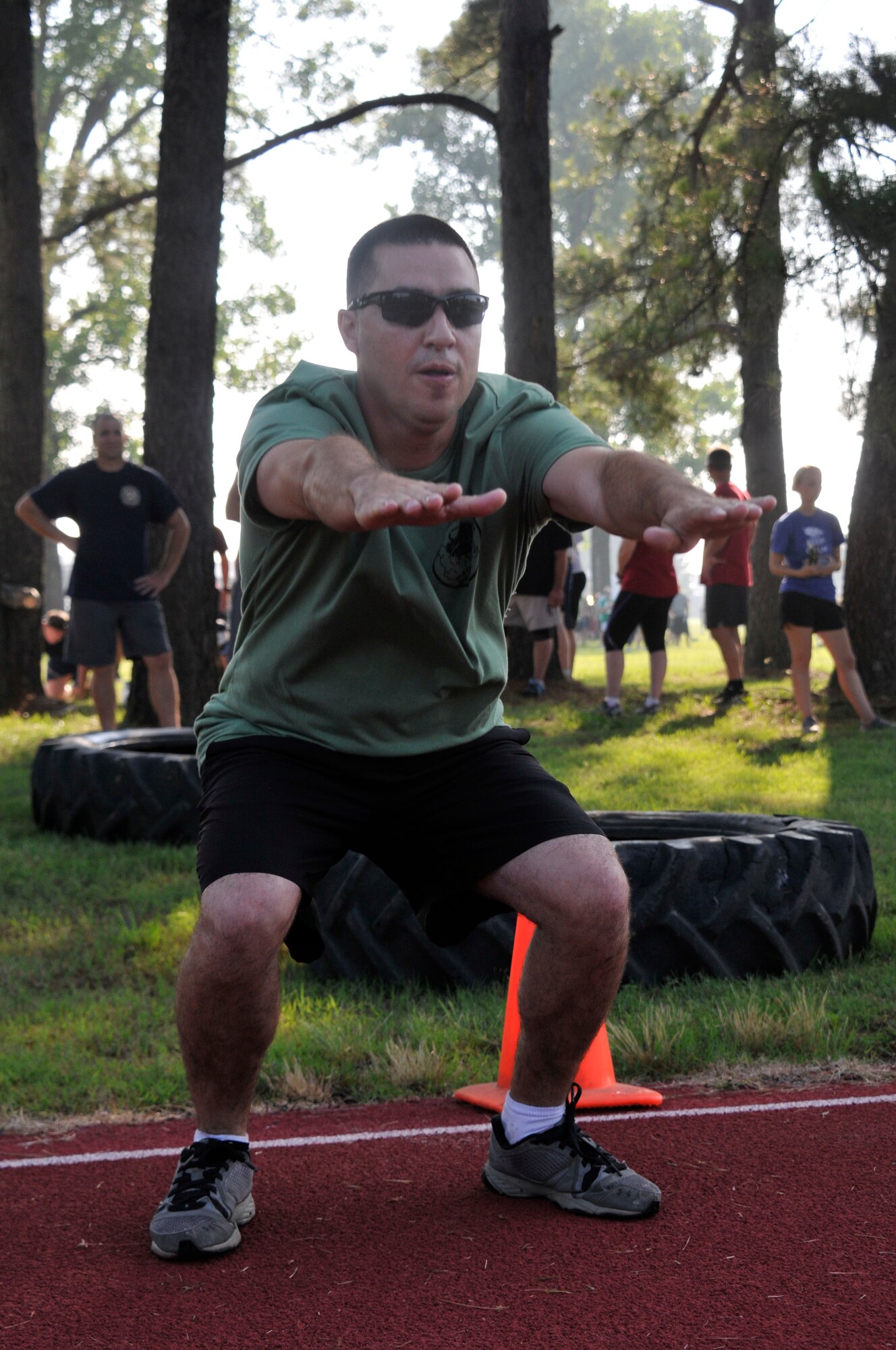 Members of the 188th Wing gathered together to compete in multiple physical challenges for Wingman day 2015 held June 7, at Ebbing Air National Guard Base, Fort Smith, Ark. Wingman Day is designed to encourage Airmen to build and foster positive relationships in their work areas and throughout the wing. The day’s events consisted of a 1.5 mile run, volleyball, horseshoes, a mile relay, free-throw competition, golf pitching and a casting contest. Brig. Gen. James Vogel, Arkansas Air National Guard commander, and Col. Bobbi Doorenbos, 188th Wing commander, presented awards to team winners at the conclusion of the day’s events. (U.S. Air National Guard photo by Staff Sgt. John Suleski/Released)