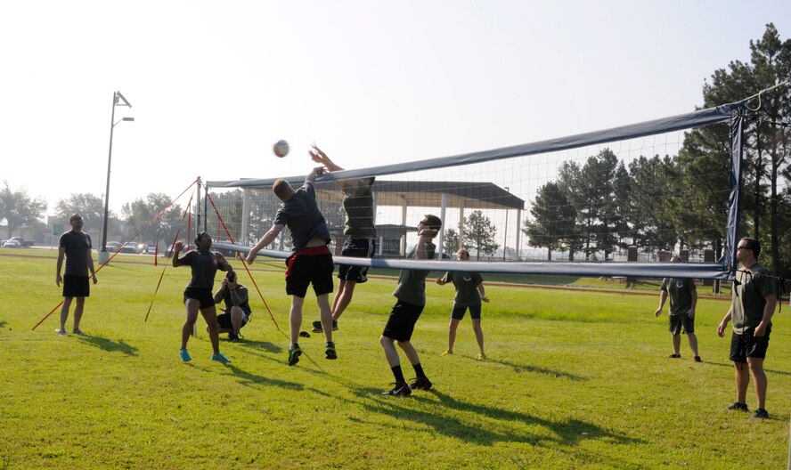 Members of the 188th Wing gathered together to compete in multiple physical challenges for Wingman day 2015 held June 7, at Ebbing Air National Guard Base, Fort Smith, Ark. Wingman Day is designed to encourage Airmen to build and foster positive relationships in their work areas and throughout the wing. The day’s events consisted of a 1.5 mile run, volleyball, horseshoes, a mile relay, free-throw competition, golf pitching and a casting contest. Brig. Gen. James Vogel, Arkansas Air National Guard commander, and Col. Bobbi Doorenbos, 188th Wing commander, presented awards to team winners at the conclusion of the day’s events. (U.S. Air National Guard photo by Staff Sgt. Hannah Dickerson/Released)