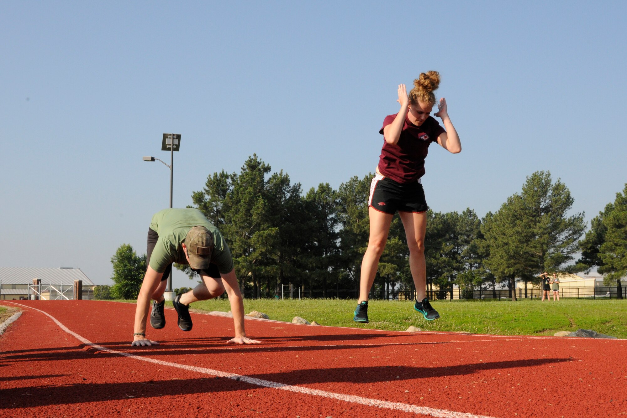Members of the 188th Wing gathered together to compete in multiple physical challenges for Wingman day 2015 held June 7, at Ebbing Air National Guard Base, Fort Smith, Ark. Wingman Day is designed to encourage Airmen to build and foster positive relationships in their work areas and throughout the wing. The day’s events consisted of a 1.5 mile run, volleyball, horseshoes, a mile relay, free-throw competition, golf pitching and a casting contest. Brig. Gen. James Vogel, Arkansas Air National Guard commander, and Col. Bobbi Doorenbos, 188th Wing commander, presented awards to team winners at the conclusion of the day’s events. (U.S. Air National Guard photo by Staff Sgt. Hannah Dickerson/Released)