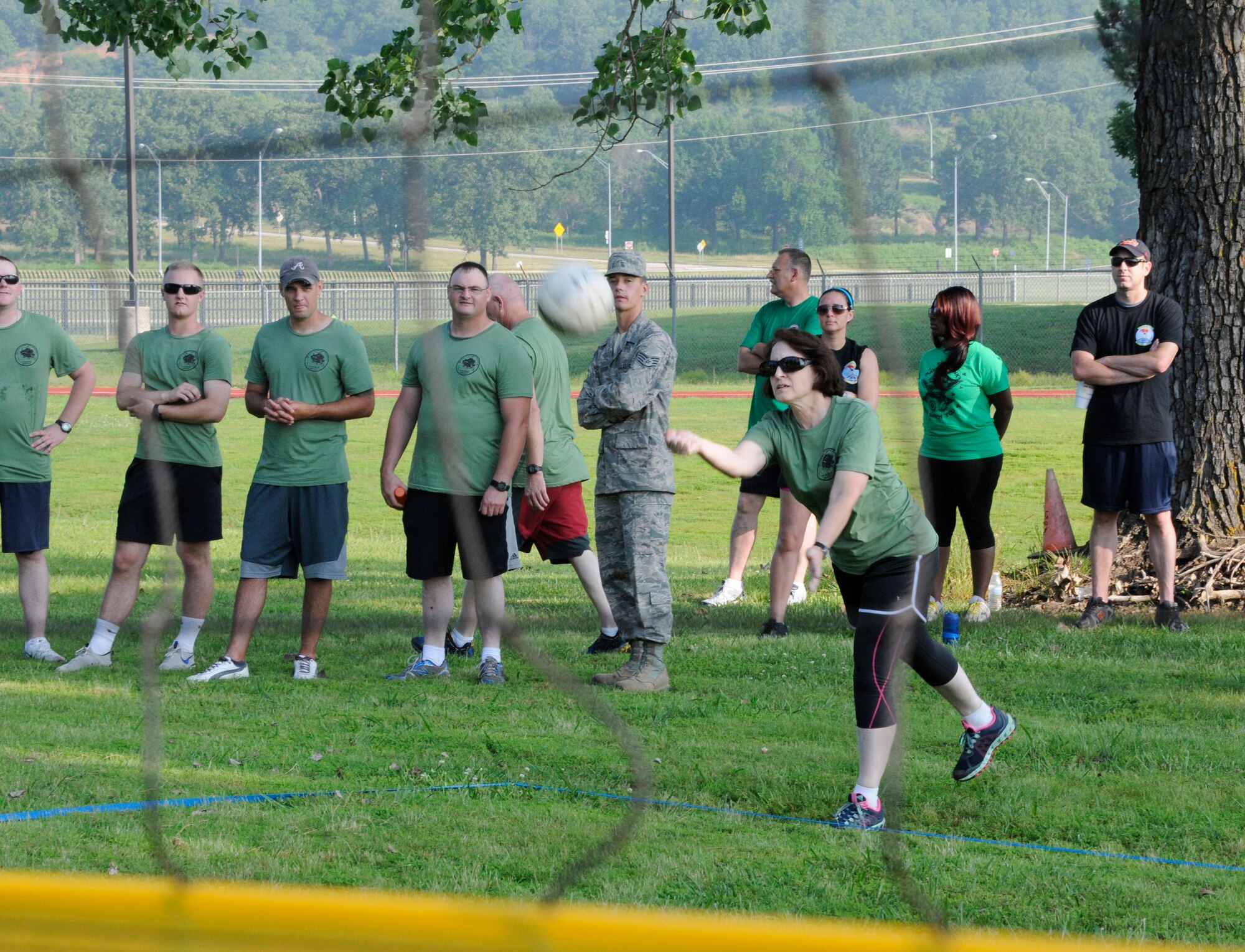 Members of the 188th Wing gathered together to compete in multiple physical challenges for Wingman day 2015 held June 7, at Ebbing Air National Guard Base, Fort Smith, Ark. Wingman Day is designed to encourage Airmen to build and foster positive relationships in their work areas and throughout the wing. The day’s events consisted of a 1.5 mile run, volleyball, horseshoes, a mile relay, free-throw competition, golf pitching and a casting contest. Brig. Gen. James Vogel, Arkansas Air National Guard commander, and Col. Bobbi Doorenbos, 188th Wing commander, presented awards to team winners at the conclusion of the day’s events. (U.S. Air National Guard photo by Staff Sgt. Hannah Dickerson/Released)