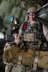 A U.S. Airman from the 38th Rescue Squadron out of Moody Air Force Base, Ga., moves forward to jump from a C-130 Hercules aircraft assigned to the Wyoming Air National Guard's 153rd Airlift Wing during a mission for the exercise Angel Thunder 2015 near Davis-Monthan Air Force Base, Ariz., June 7, 2015. Angel Thunder is the largest and most realistic joint service, multinational, interagency combat search and rescue exercise designed to provide training for personnel recovery assets using a variety of scenarios to simulate deployment conditions and contingencies. Personnel recovery forces will train through the full spectrum of personnel recovery capabilities with ground recovery personnel, air assets, Special Forces teams and federal agents. (U.S. Air National Guard photo by Tech. Sgt. John Galvin/Released)