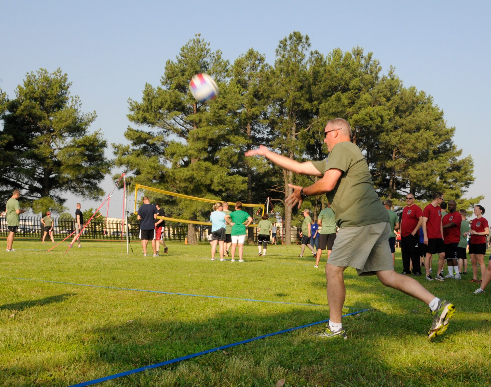 Members of the 188th Wing gathered together to compete in multiple physical challenges for Wingman day 2015 held June 7, at Ebbing Air National Guard Base, Fort Smith, Ark. Wingman Day is designed to encourage Airmen to build and foster positive relationships in their work areas and throughout the wing. The day’s events consisted of a 1.5 mile run, volleyball, horseshoes, a mile relay, free-throw competition, golf pitching and a casting contest. Brig. Gen. James Vogel, Arkansas Air National Guard commander, and Col. Bobbi Doorenbos, 188th Wing commander, presented awards to team winners at the conclusion of the day’s events. (U.S. Air National Guard photo by Staff Sgt. Hannah Dickerson/Released)
