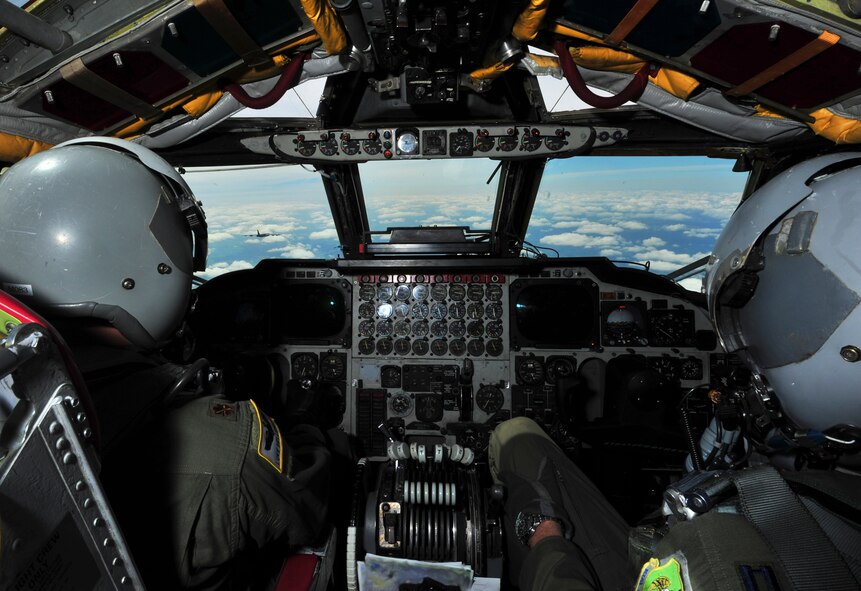 Two B-52H Stratofortress pilots maneuver behind the lead aircraft to complete a simulated air strike during exercise Saber Strike 15 in Europe, June 8, 2015. Bomber operations provide a credible, flexible and ready capability to respond to a variety of potential threats and situations. Saber Strike 15 promotes regional stability and security, while strengthening partner capabilities and trust. (U.S. Air Force photos/Senior Airman Malia Jenkins)