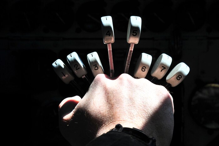 Maj. Luke Dellenbach, 69th Bomb Squadron director of staff, pushes on the throttle during a simulated air strike exercise for Saber Strike 15 in Europe, June 8, 2015. Saber Strike 15 provides training opportunities in the Baltic region in preparation for NATO Response Force certification. U.S. Strategic Command bomber missions provide unique opportunities to integrate and train with Geographic Combatant Commands and the United States’ allies and partners in joint and coalition operations and exercises. (U.S. Air Force photo/Senior Airman Malia Jenkins)
