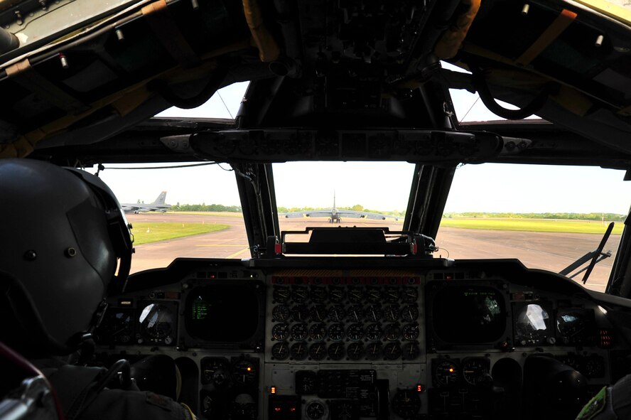 Two B-52H Stratofortresses from Minot Air Force Base, N.D., taxi onto the runway at Royal Force Fairford, England, June 8, 2015 to complete the first mission in support of exercise Saber Strike 15. Bomber operations provide a credible, flexible and ready capability to respond to a variety of potential threats and situations. Three B-52s forward deployed in support of Saber Strike 15 to help promote regional stability and security. (U.S. Air Force photos/Senior Airman Malia Jenkins)