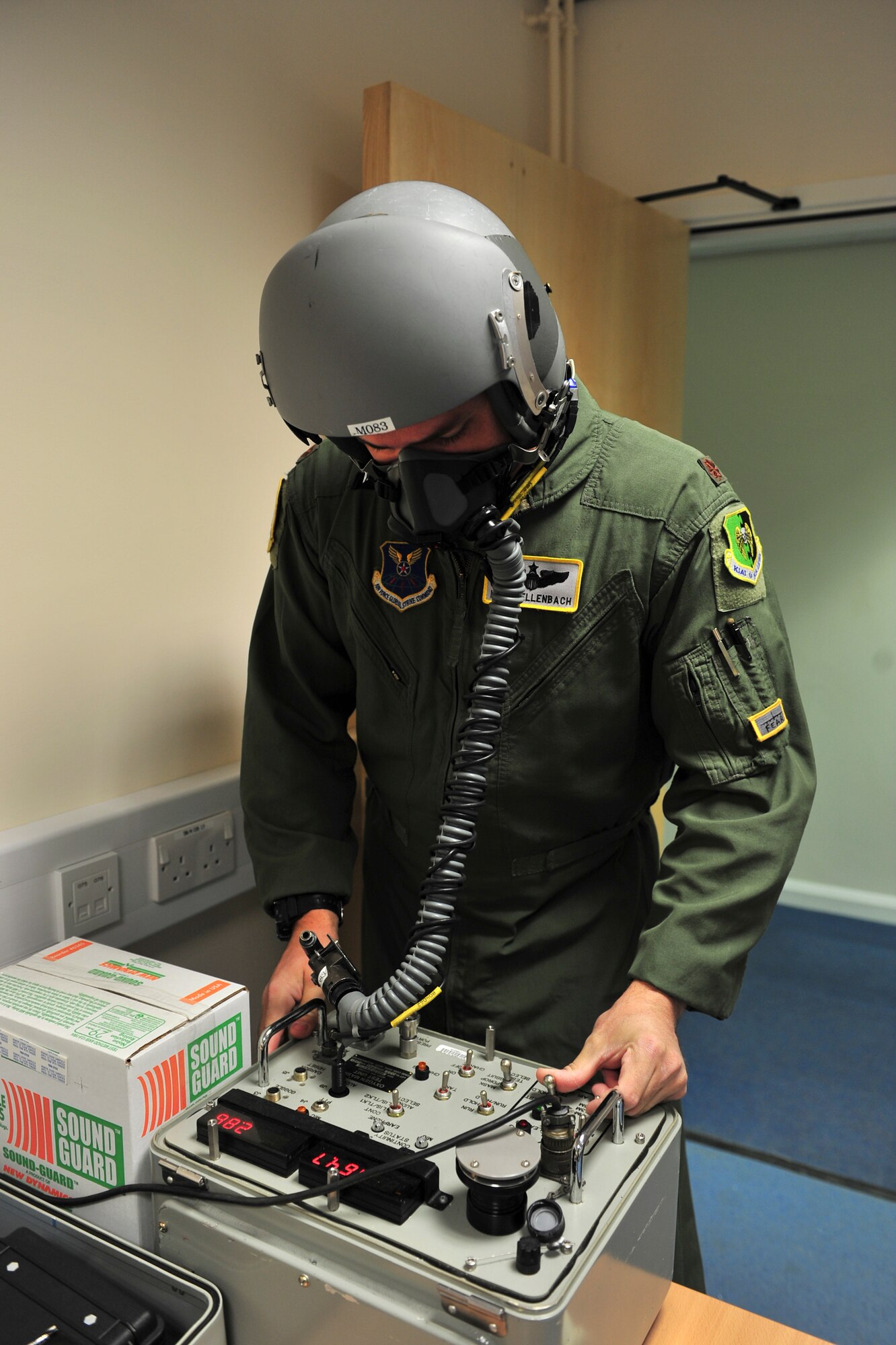 Maj. Luke Dellenbach, 69th Bomb Squadron director of staff, checks his mask at Royal Air Force Fairford, England, June 8, 2015 before the first mission in support of exercise Saber Strike 15. The deployment to RAF Fairford was specifically designed and closely coordinated between the United States, the United Kingdom and their allies and partners to ensure maximum opportunities to improve our interoperability while working toward mutual goals. (U.S. Air Force photo/Senior Airman Malia Jenkins)  