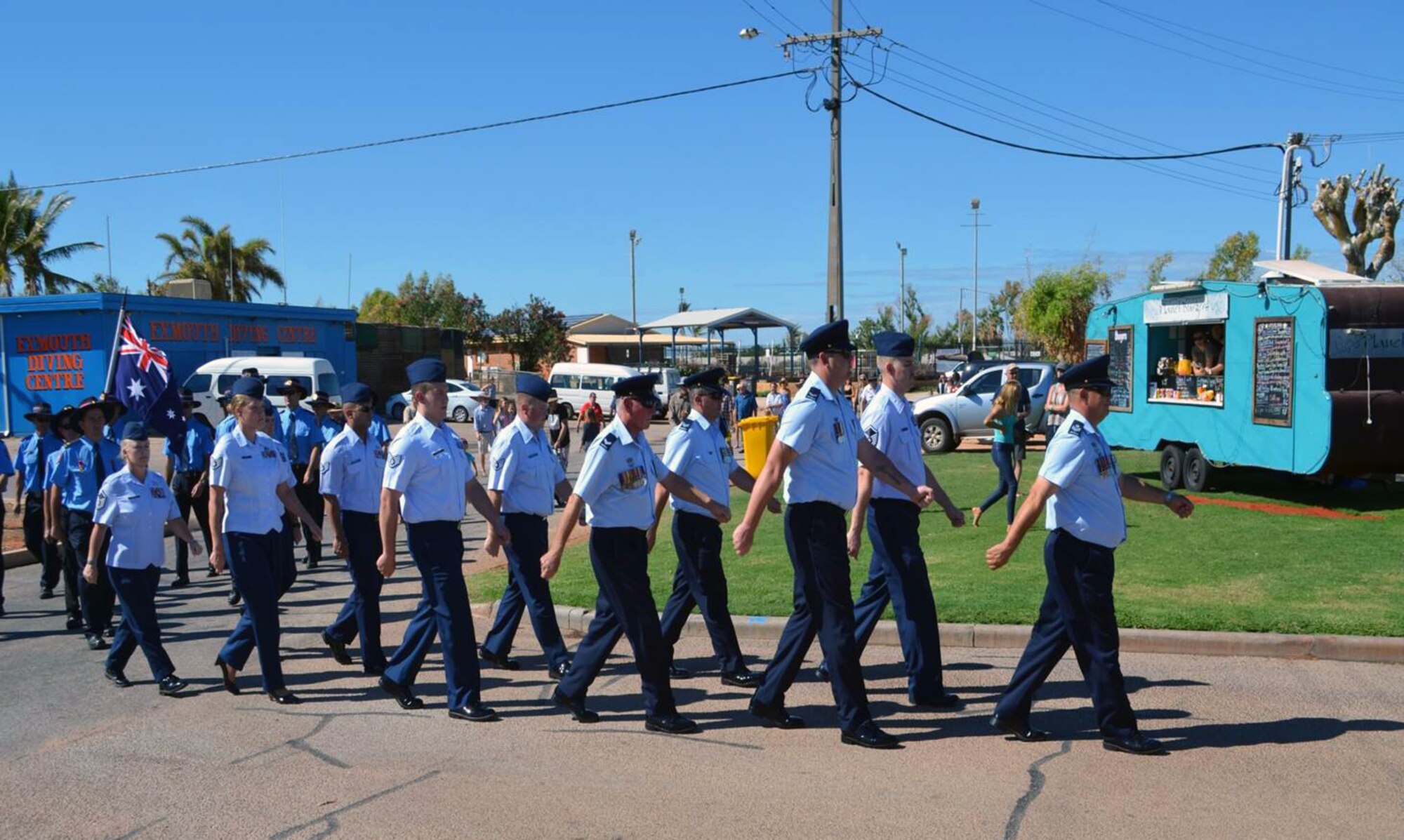 Airmen from Detachment 1, 2nd Weather Squadron, march alongside members of the Australian military in the ANZAC Day parade April 25 in Exmouth, Australia. ANZAC Day is recognized every year and marks the first major military action fought by Australia and New Zealand during WWI at Gallipoli. (U.S. Air Force courtesy photo)