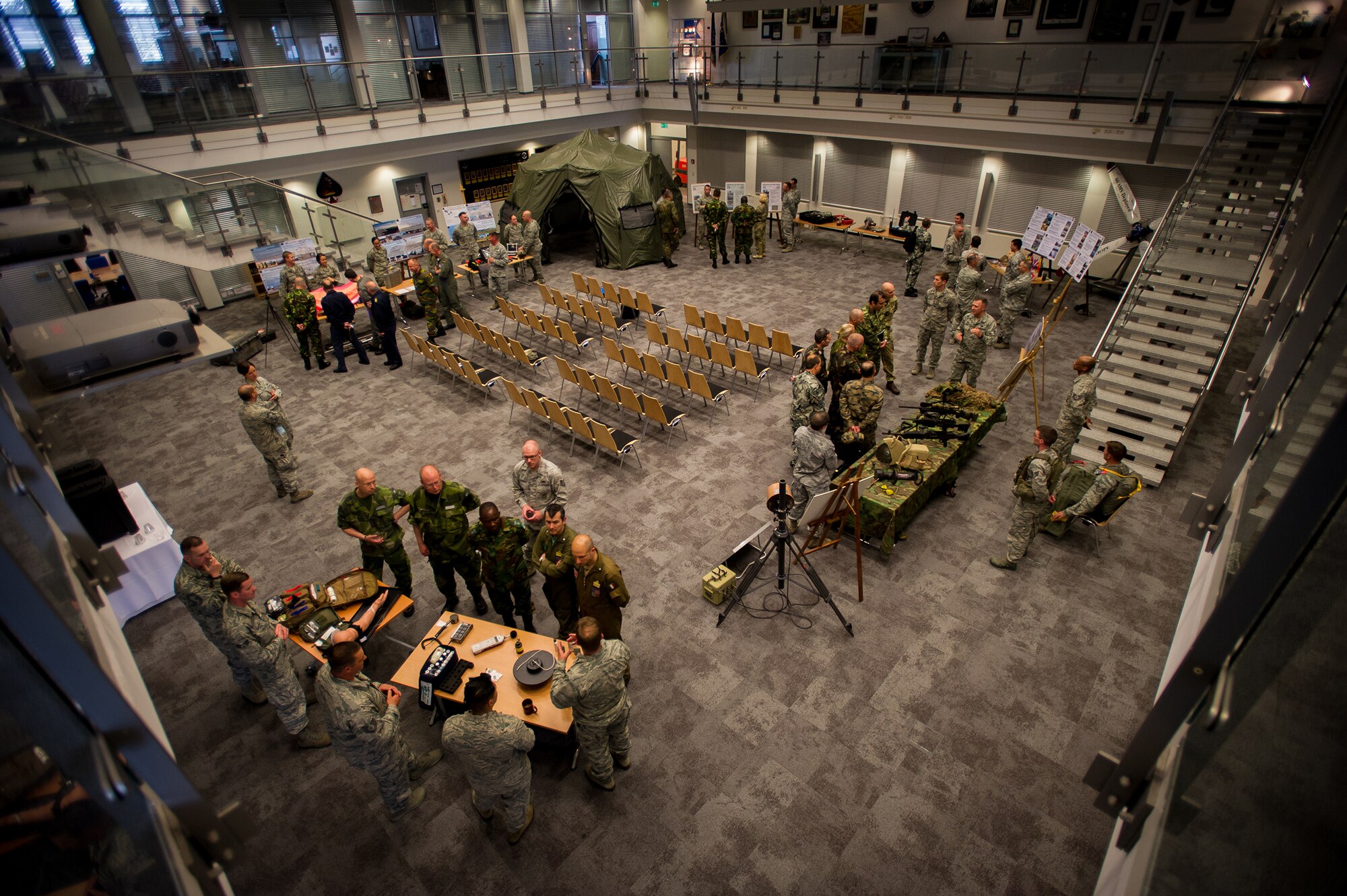 Senior enlisted and officers from multiple countries throughout Europe and Africa tour the 435th Contingency Response Group during a the Professional Military Development Symposium at Ramstein Air Base, Germany, June 3, 2015. This inaugural PMD course was designed to bring allied and partner nations together to exchange ideas and best practices with the goal of improving their militaries. (U.S. Air Force photo/ Tech. Sgt. Ryan Crane)