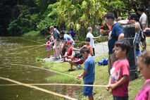 Children and parents from Joint Base Pearl Harbor-Hickam participate in the 16th Annual Friends of Hickam Keiki Fishing Tournament  at the Ho`omaluhia Botanical Gardens in Kaneohe, June 5, 2015. More than 100 members from JBPHH and their children participated in the free fishing tournament hosted by "Friends of Hickam," an organization seeking to support, promote, and foster strong community relations with military families. (U.S. Air Force photo by Tech. Sgt. Aaron Oelrich/Released)