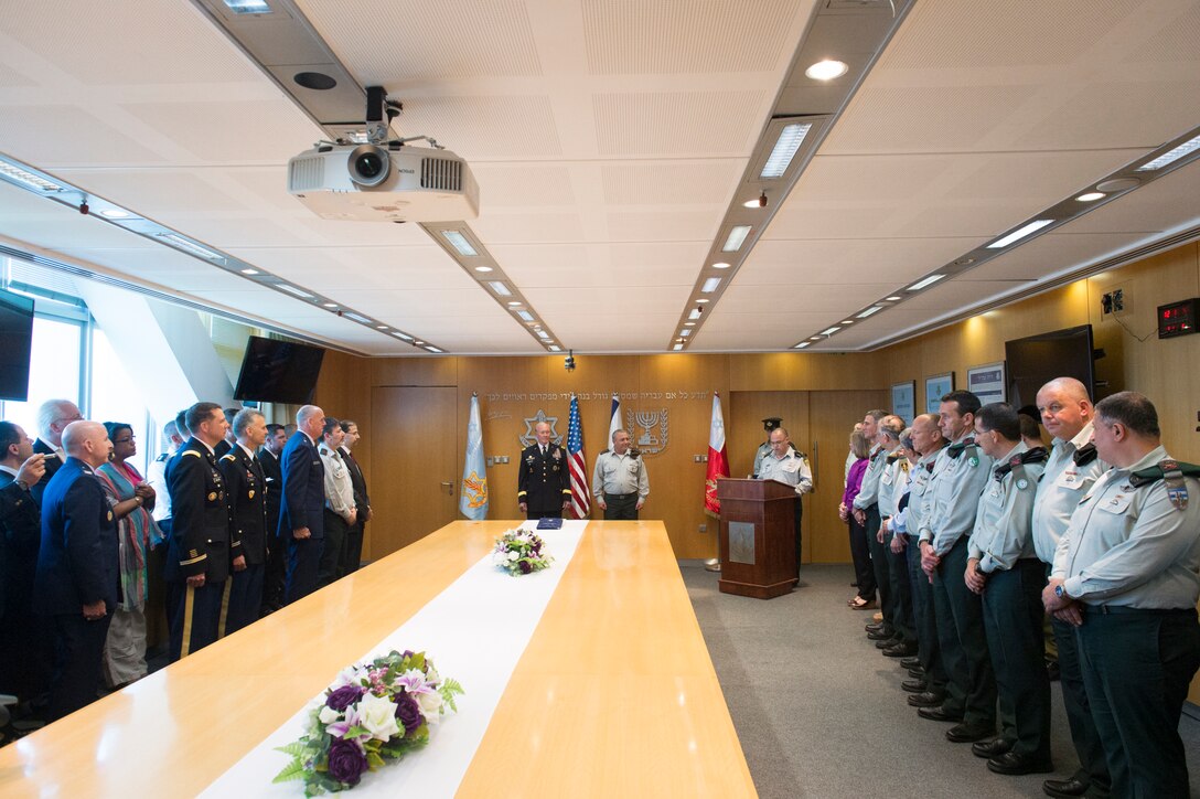 Israeli Defense Chief Lt. Gen. Gadi Eisenkot offers remarks before he presents the Distinguished Ally of Israeli Defense Forces award to U.S. Army Gen. Martin E. Dempsey, chairman of the Joint Chiefs of Staff, inTel Aviv, Israel, June 9, 2015.