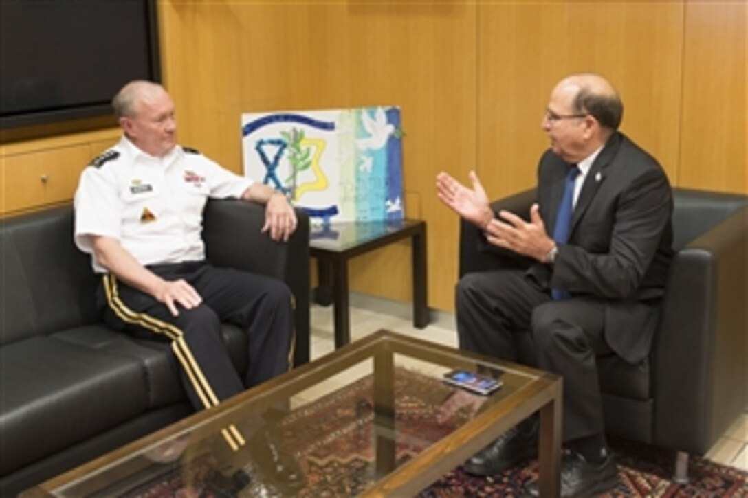 U.S. Army Gen. Martin E. Dempsey, left, chairman of the Joint Chiefs of Staff, meets with Israeli Defense Minister Moshe Yaalon in Tel Aviv, Israel, June 9, 2015.