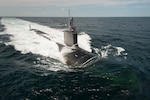 The Virginia-class attack submarine  Pre-Commissioning Unit (PCU) John Warner (SSN 785) conducts sea trials in the Atlantic Ocean.