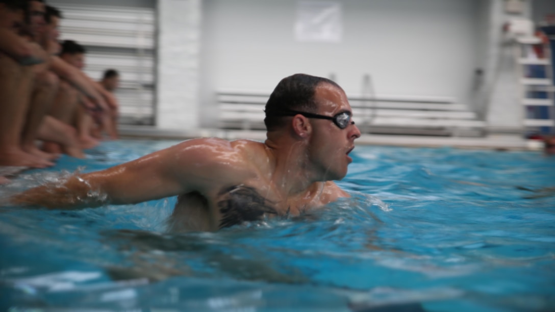 Sergeant Timothy Ashe, a reconnaissance Marine with 2nd Reconnaissance Battalion, 2nd Marine Division, finishes the drown-proofing event during a Special Operations Command screener during a pre-dive course at Marine Corps Base Camp Lejeune, N.C., May 25 – June 5, 2015. During the drown-proofing event the Marines performed various exercises with their feet and hands tied together behind their back with no rest between each exercise. 