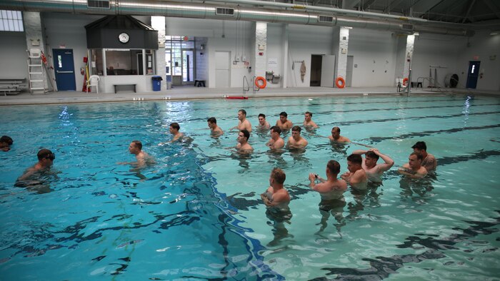Marines with 2nd Reconnaissance Battalion, 2nd Marine Division, prepare to dive and perform underwater knot-tying in a Special Operation Command screener during a pre-dive course at Marine Corps Base Camp Lejeune, N.C., May 25 – June 5, 2015. The students had to tie five knots underwater; having only five separate breathing opportunities with only 30 seconds on the surface of the water between tying each knot. 