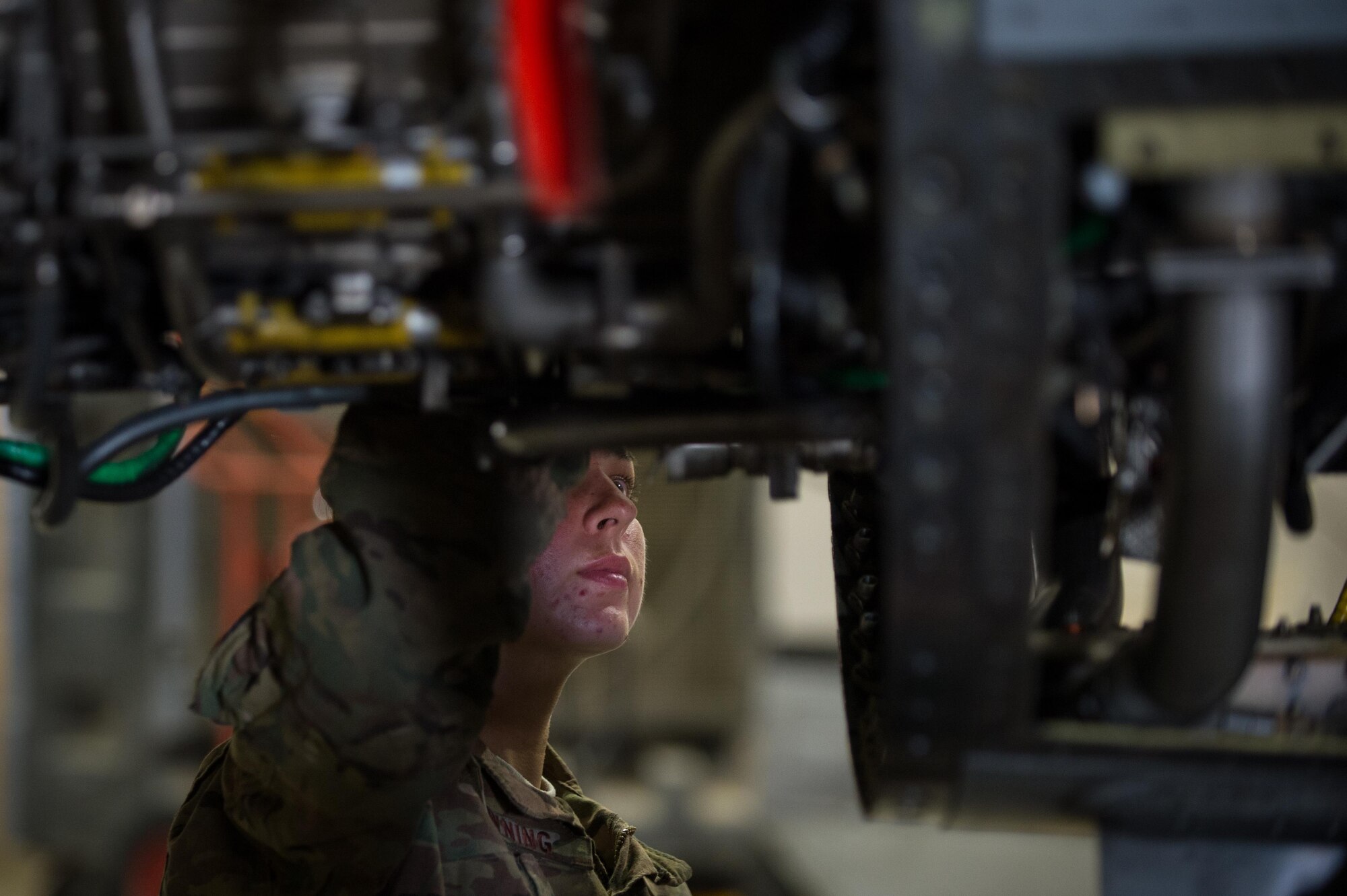 U.S. Air Force Senior Airman Jaid Downing, 455th Expeditionary Maintenance Squadron, performs a 400-hour engine inspection on an F-16 Fighting Falcon aircraft at Bagram Airfield, Afghanistan, June 9, 2015. The 455th EAMXS ensure Fighting Falcons on Bagram are prepared for flight and return them to a mission-ready state once they land.  (U.S. Air Force photo by Tech. Sgt. Joseph Swafford/Released)