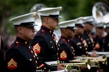 U.S. Marines with the 1st Marine Division Band participate in an anniversary ceremony with the French Legionnaires on Aisne Marne American Cemetery in Belleau, France, on May 31, 2015. The ceremony was held to commemorate the Battle of Belleau Wood. (U.S. Marine Corps Photo by Sgt. Luis A. Vega/Released)