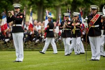 U.S. Marine Corps Mollie Juberien, a piccolo player with the 1st Marine Division Band, plays a solo during an anniversary ceremony with the French Legionnaires on Aisne Marne American Cemetery in Belleau, France, on May 31, 2015. The ceremony was held to commemorate the Battle of Belleau Wood. (U.S. Marine Corps Photo by Sgt. Luis A. Vega/Released)