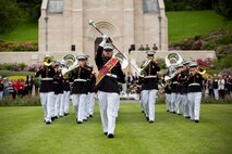 U.S. Marines with the 1st Marine Division Band march off the field during an anniversary ceremony with the French Legionnaires on Aisne Marne American Cemetery in Belleau, France, on May 31, 2015. The ceremony was held to commemorate the Battle of Belleau Wood. (U.S. Marine Corps Photo by Sgt. Luis A. Vega/Released)