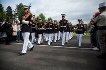 U.S. Marines with the 1st Marine Division Band march off the field during an anniversary ceremony with the French Legionnaires on Aisne Marne American Cemetery in Belleau, France, on May 31, 2015. The ceremony was held to commemorate the Battle of Belleau Wood. (U.S. Marine Corps Photo by Sgt. Luis A. Vega/Released)