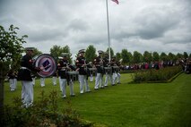 U.S. Marines with the 1st Marine Division Band perform a drum break on the field during an anniversary ceremony with the French Legionnaires on Aisne Marne American Cemetery in Belleau, France, on May 31, 2015. The ceremony was held to commemorate the Battle of Belleau Wood. (U.S. Marine Corps Photo by Sgt. Luis A. Vega/Released)