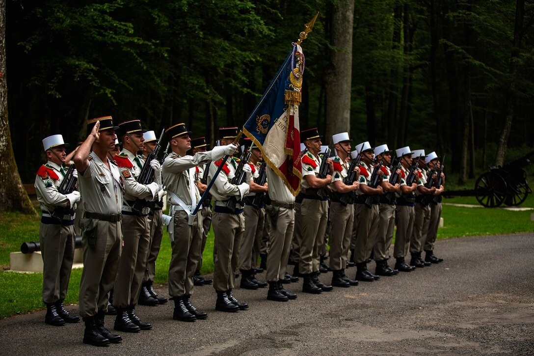 U.S. Marines from the 1st Marine Division and their French counterparts gather at Aisne-Marne American Cemetery to commemorate their fallen heroes in Belleau, France on May 31, 2015. This Memorial Day ceremony was held in honor of the 97th anniversary of the Battle of Belleau Wood. (U.S. Marine Corps photo by Lance Cpl. Akeel Austin/Released)