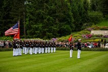 U.S. Marines from the 1st Marine Division and their French counterparts gather at Aisne-Marne American Cemetery to commemorate their fallen heroes in Belleau, France on May 31, 2015. This Memorial Day ceremony was held in honor of the 97th anniversary of the Battle of Belleau Wood. (U.S. Marine Corps photo by Lance Cpl. Akeel Austin/Released)
